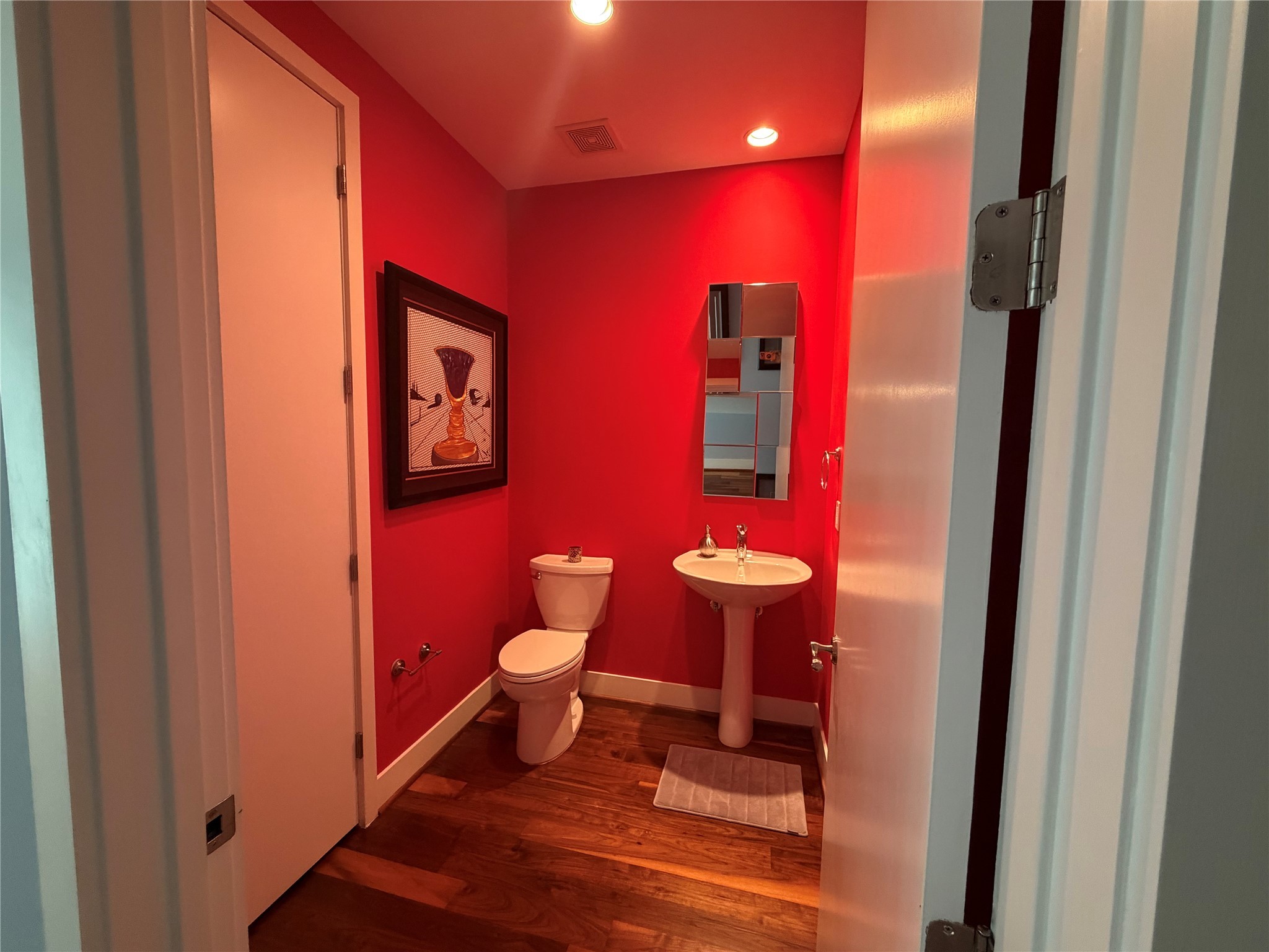 1600 Post Oak Boulevard, Unit 1206 Houston, TX 77056 - Photo 18 of 50 a bathroom with a sink and a toilet