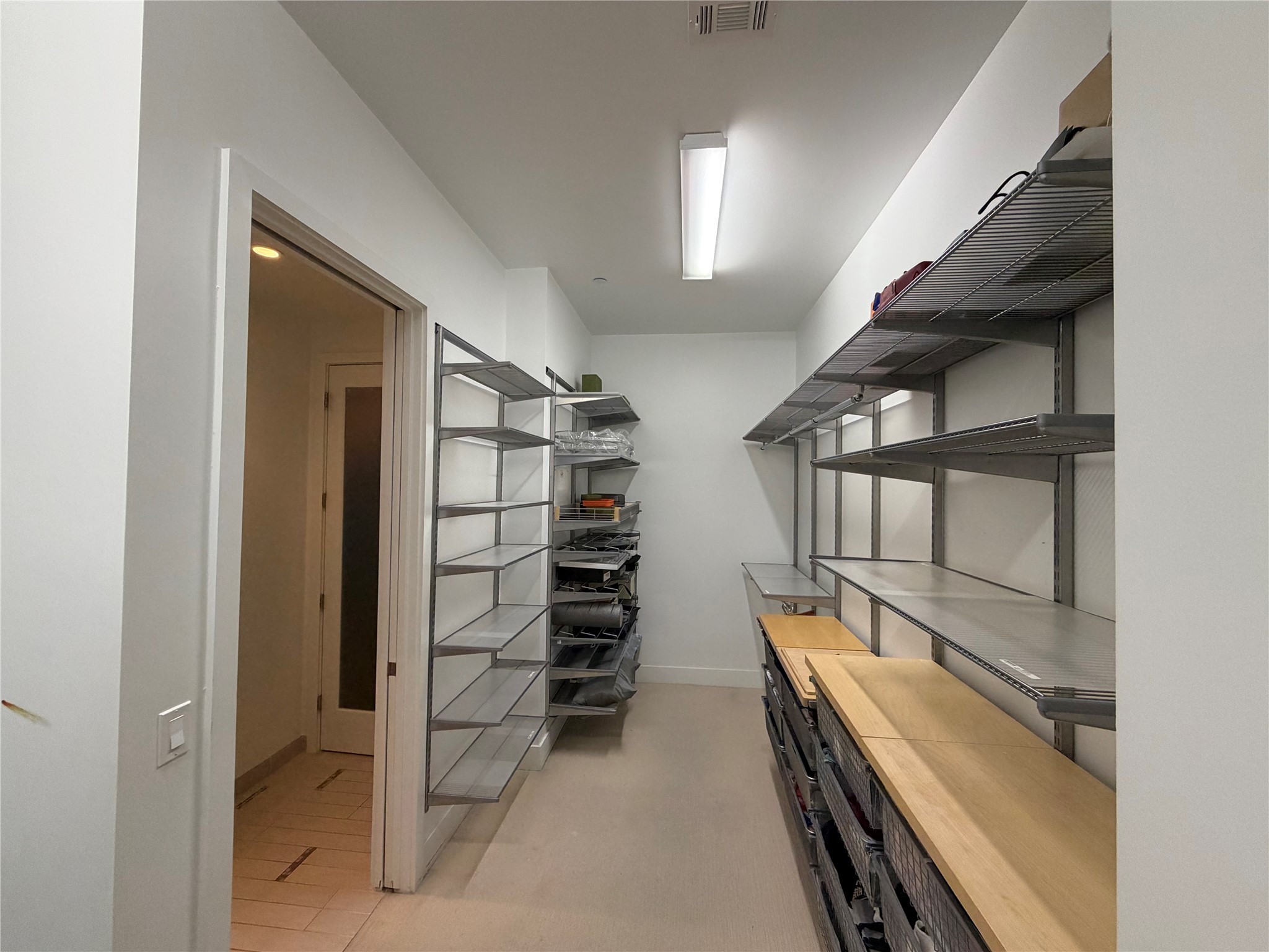 1600 Post Oak Boulevard, Unit 1206 Houston, TX 77056 - Photo 21 of 50 Huge Walk-In Closet. Elfa systems. Another section of the closet not in the picture. Over $50K Spent on Elfa and SOMFY Power Blind Systems.