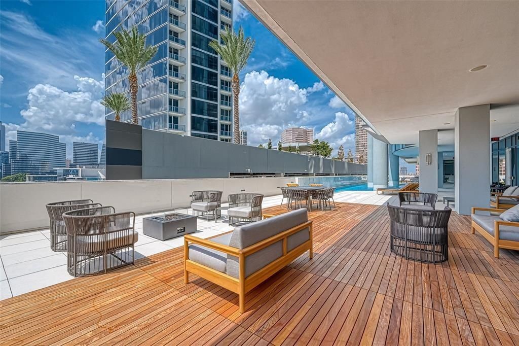1600 Post Oak Boulevard, Unit 1206 Houston, TX 77056 - Photo 42 of 50 Beautiful Teak area by the pool overlooking Post Oak Blvd and Downtown plus the Medical Center.