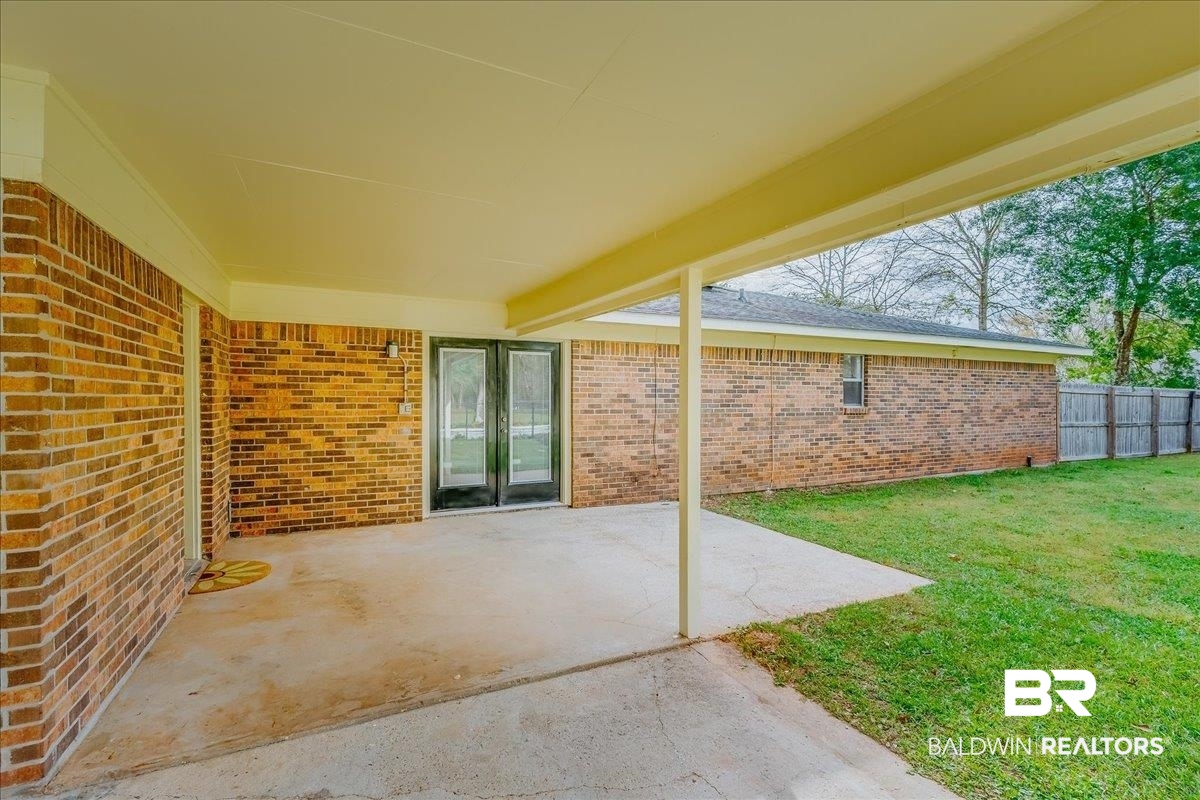 440 Dykes Road Mobile, AL 36608 - Photo 41 of 49 View of patio / terrace with fence