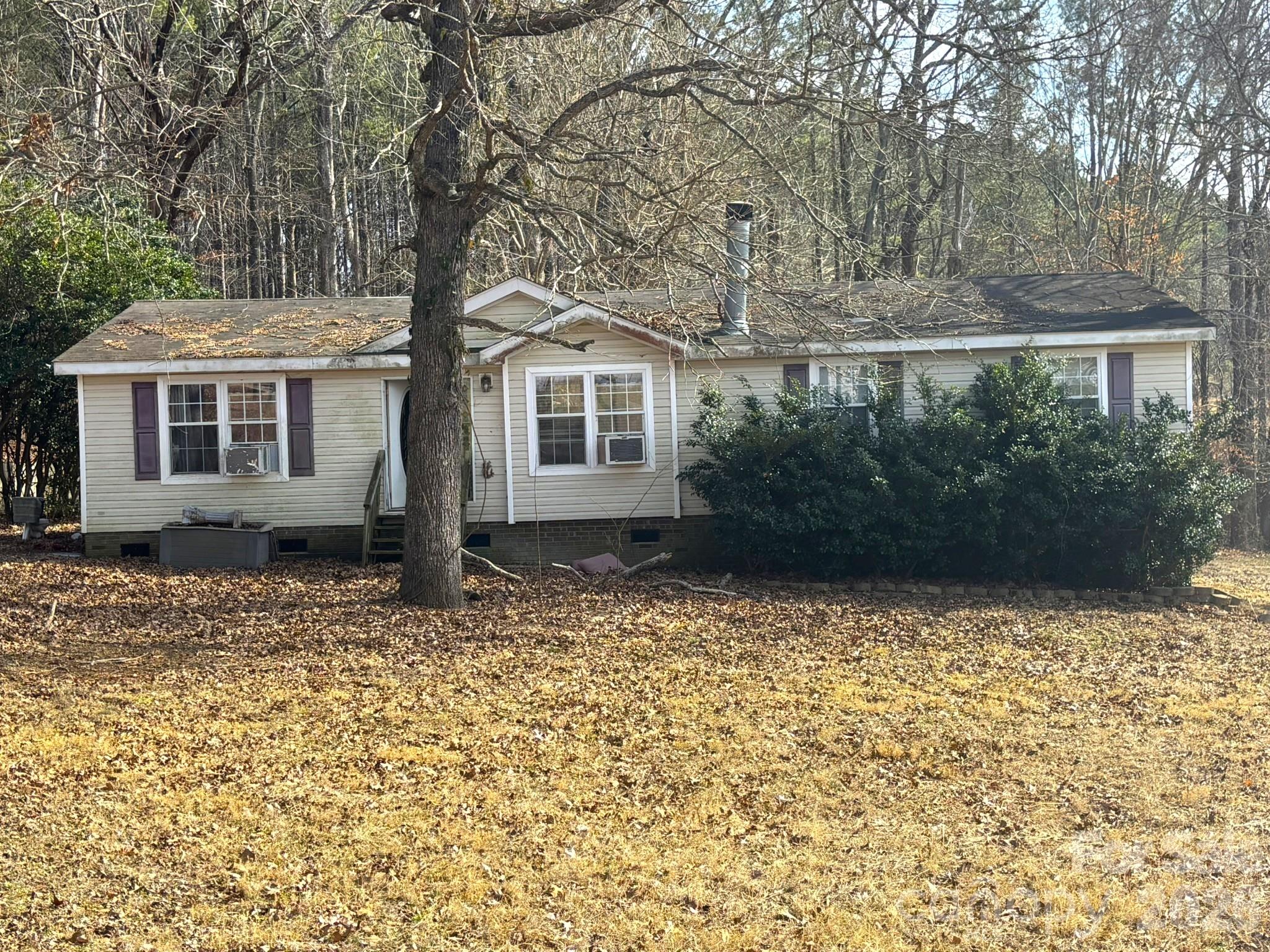 1051 High Meadows Drive Concord, NC 28025 - Photo 1 of 14 front view of a house with a yard