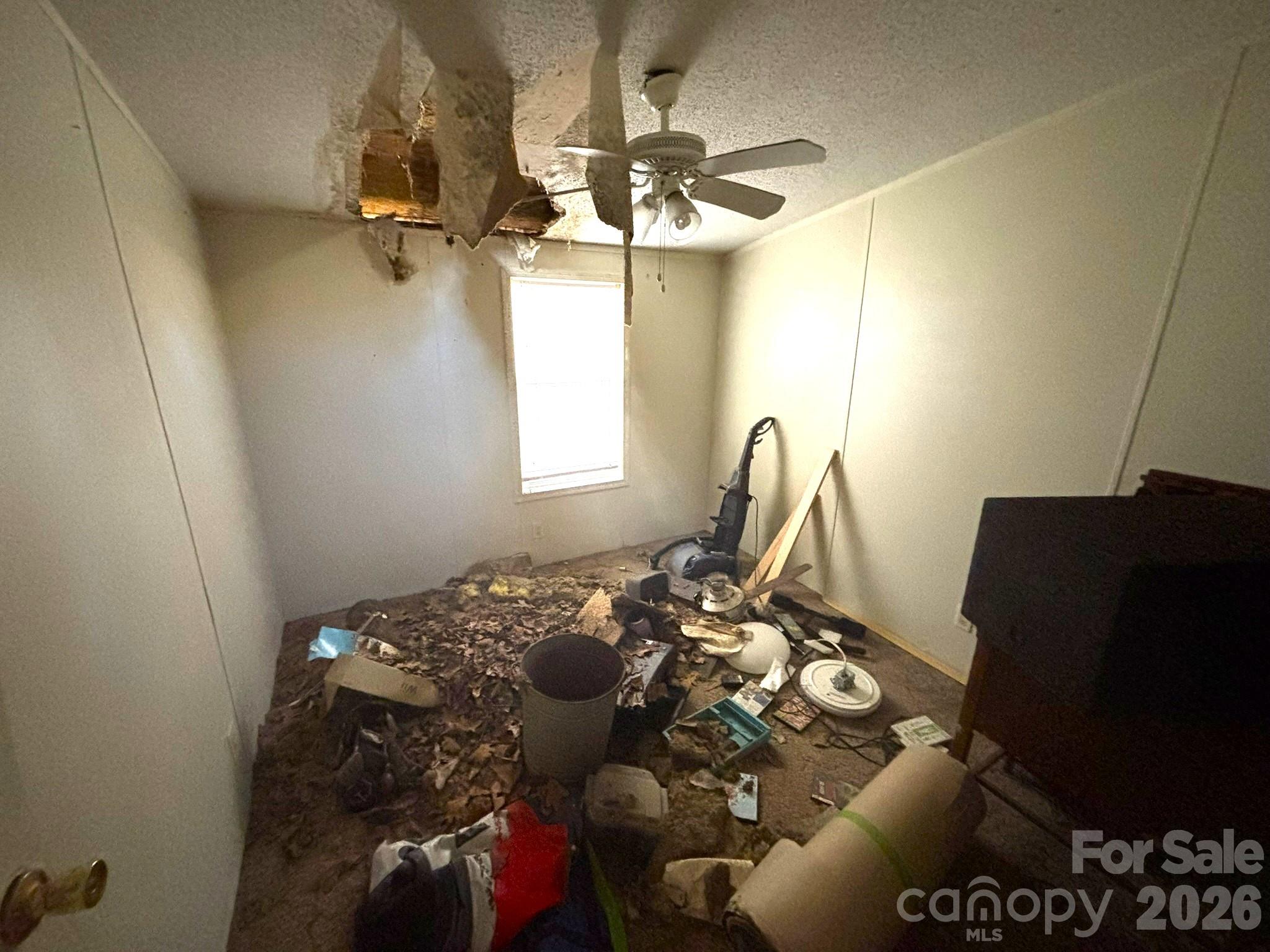 1051 High Meadows Drive Concord, NC 28025 - Photo 3 of 14 a bedroom with a bed and a chandelier