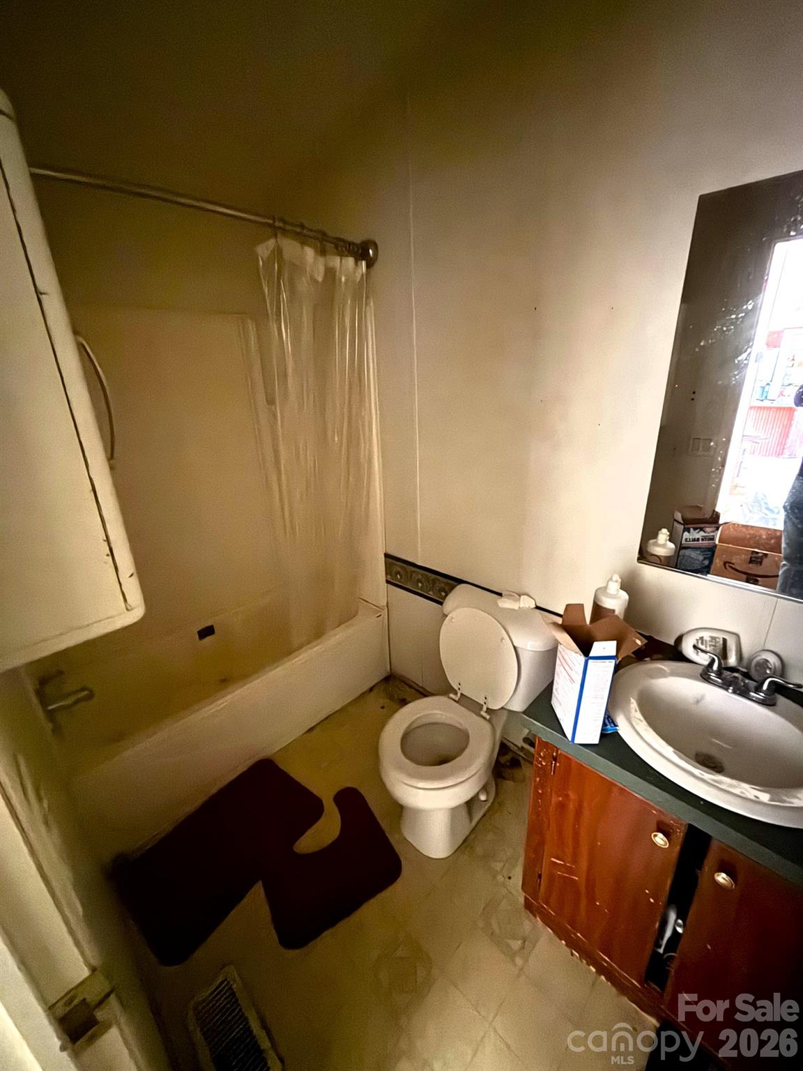 1051 High Meadows Drive Concord, NC 28025 - Photo 5 of 14 a bathroom with a sink mirror vanity and toilet