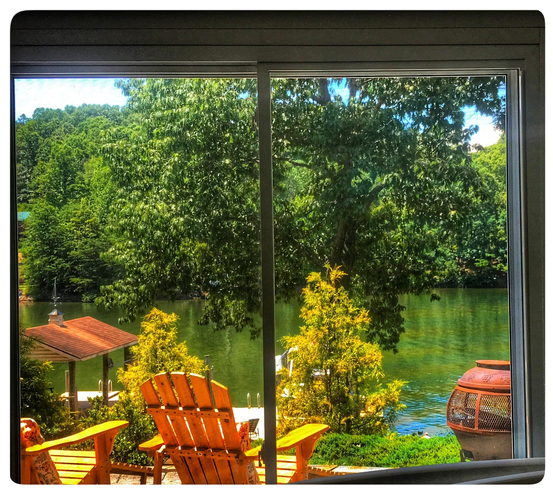 131 Highland Lake Road Union Hall, VA 24176 - Photo 7 of 75 a view of a lake from a balcony