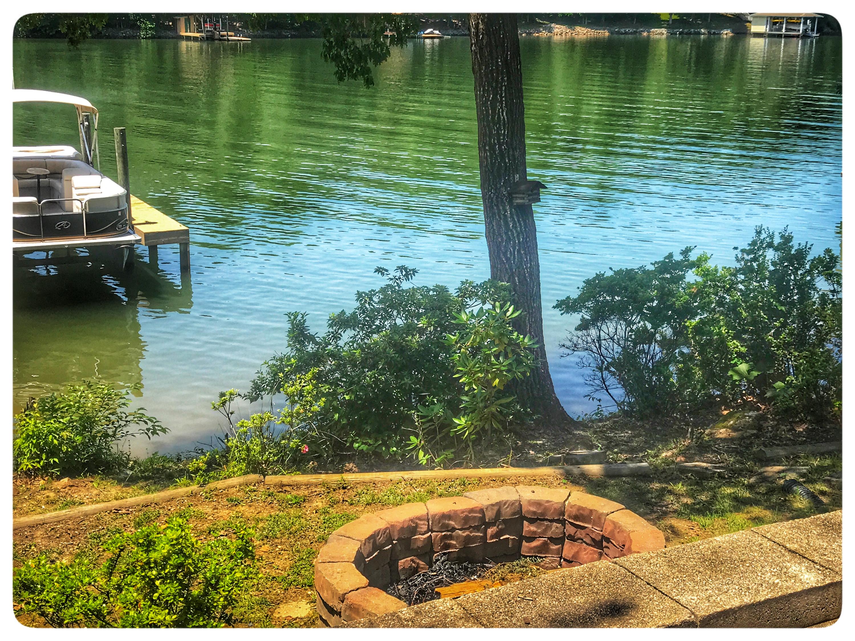 131 Highland Lake Road Union Hall, VA 24176 - Photo 8 of 75 a view of a lake from a balcony