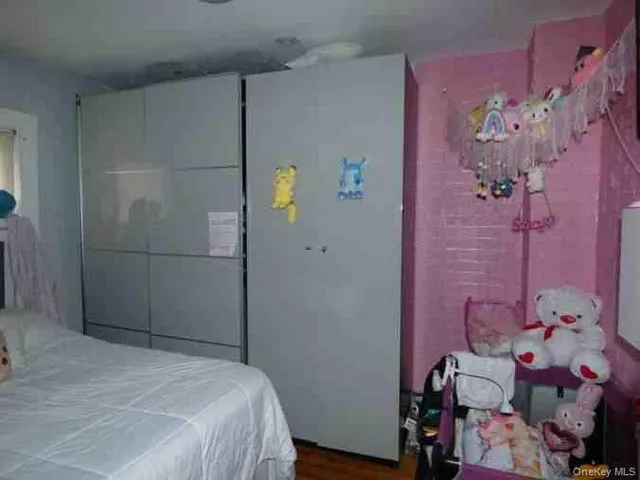 a bedroom with a bed and a table