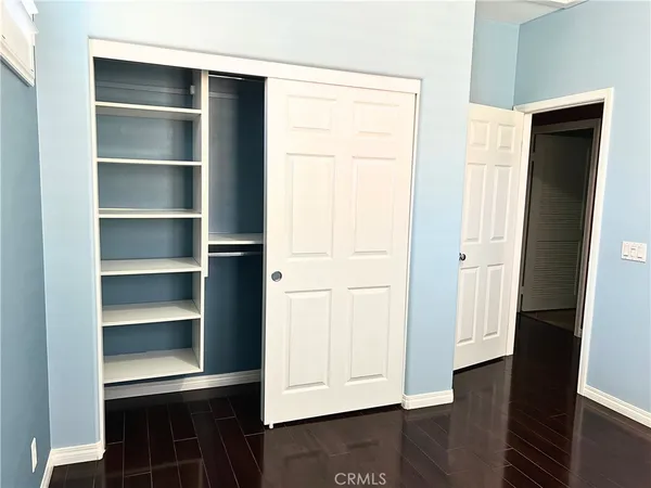 a view of a space with wooden floor