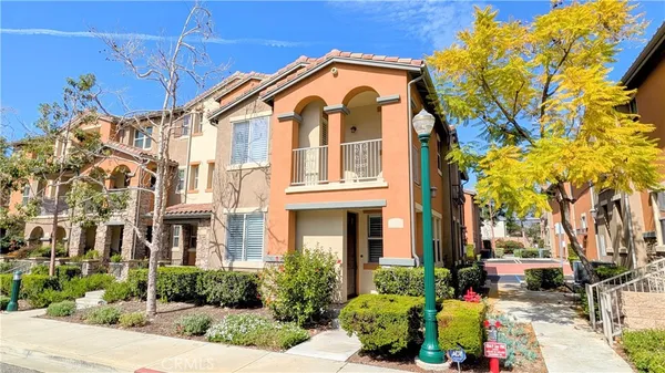 a front view of a multi story residential apartment building