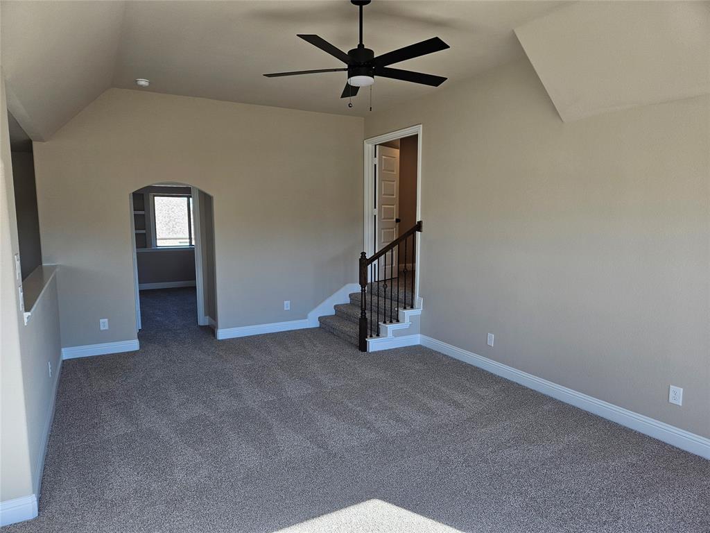 128 Red Fox Trail Godley, TX 76044 - Photo 13 of 19 an empty room with windows and fan