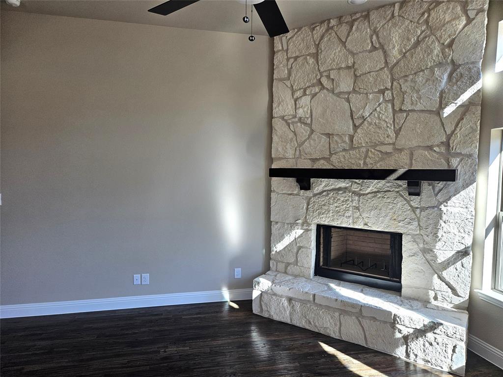 128 Red Fox Trail Godley, TX 76044 - Photo 3 of 19 a view of fireplace and wooden floor