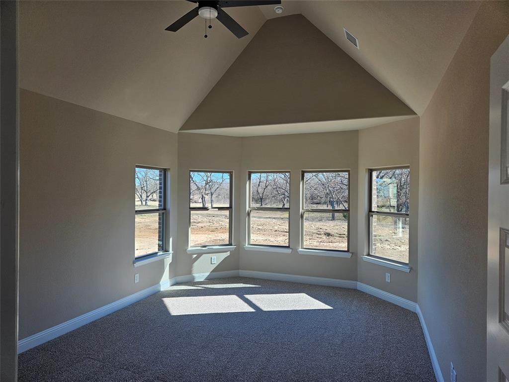 128 Red Fox Trail Godley, TX 76044 - Photo 9 of 19 a view of an empty room with a window