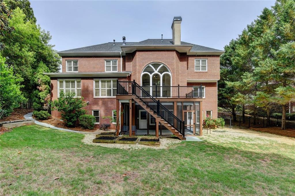 855 Autumn Close Alpharetta, GA 30004 - Photo 121 of 154 a view of a house with a yard