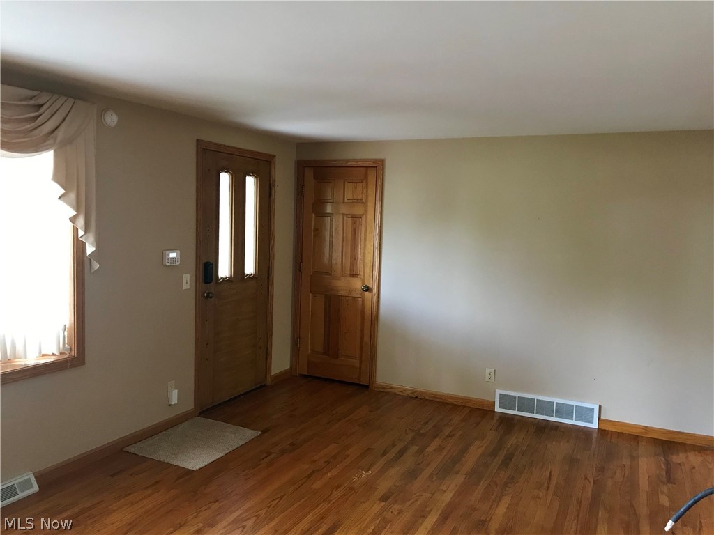 4895 4th Street Northwest Canton, OH 44708 - Photo 3 of 31 Living room with hardwood floors.
