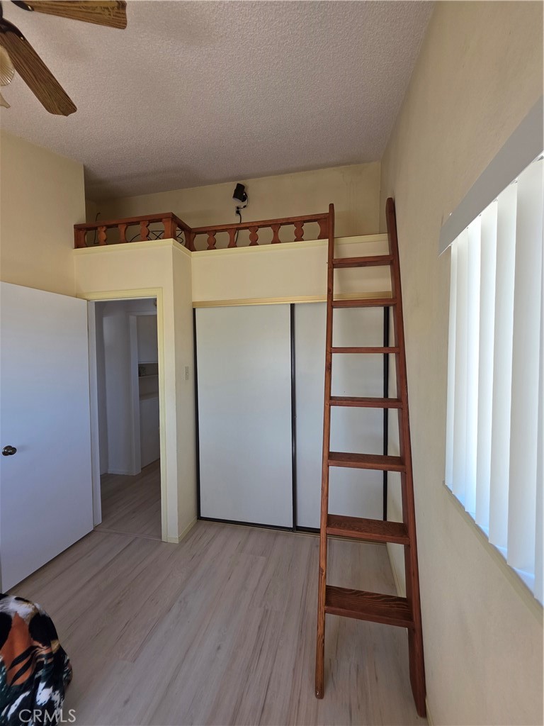 5566 Oleta Road Landers, CA 92285 - Photo 23 of 40 wooden floor in an empty room