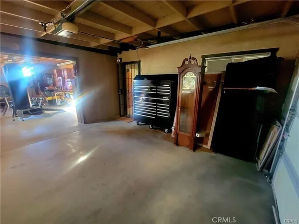 a view of room with gym equipment