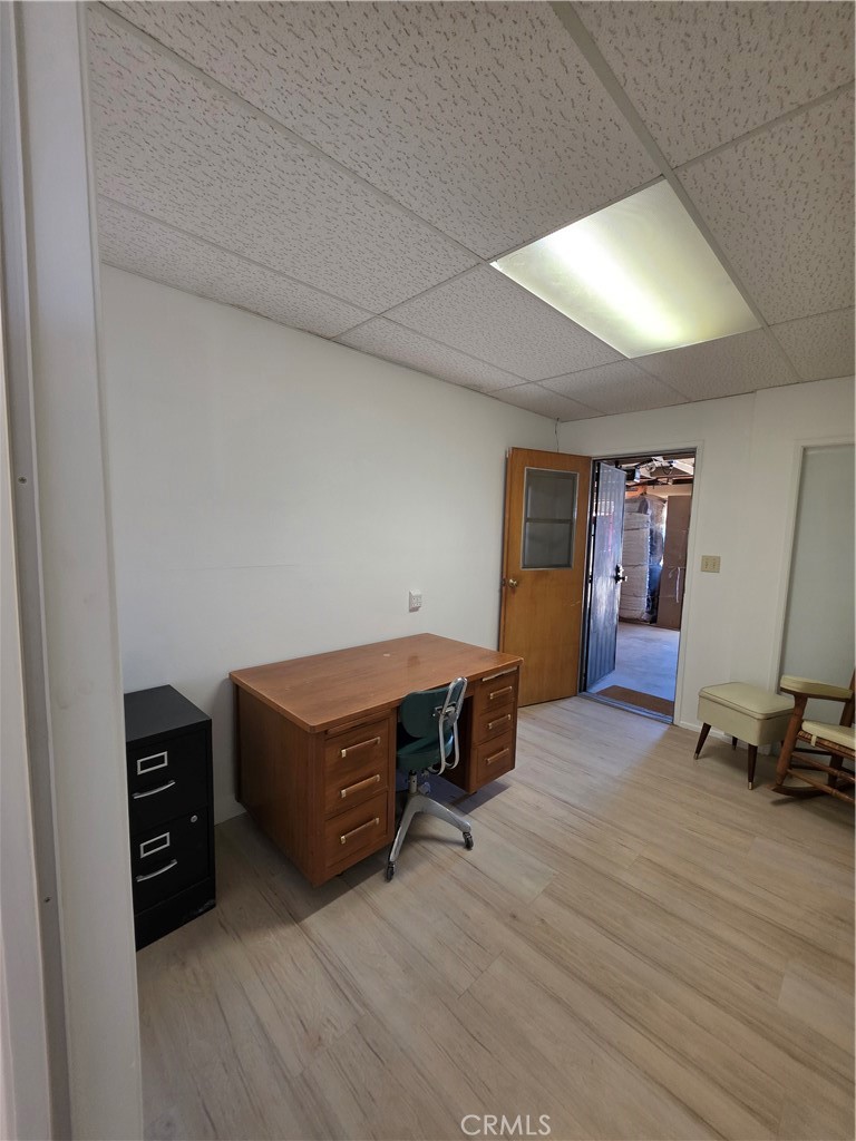 5566 Oleta Road Landers, CA 92285 - Photo 29 of 40 a room with wooden furniture and gym equipment