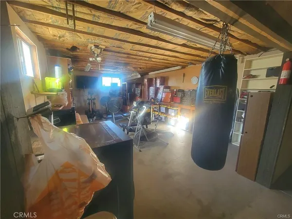 a view of room with gym equipment
