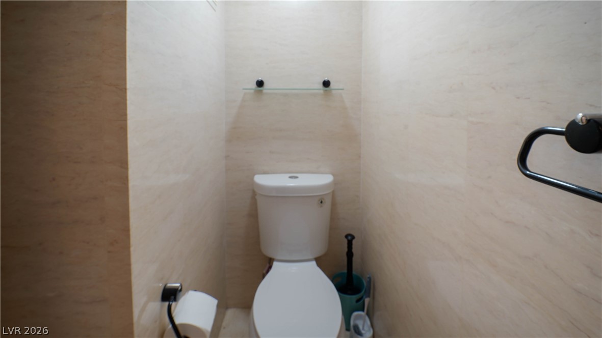 8070 West Russell Road, Unit 1099 Las Vegas, NV 89113 - Photo 26 of 31 A private water closet offers serene functionality within this well-appointed space.
