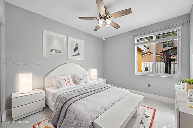 a bathroom with a toilet sink and vanity