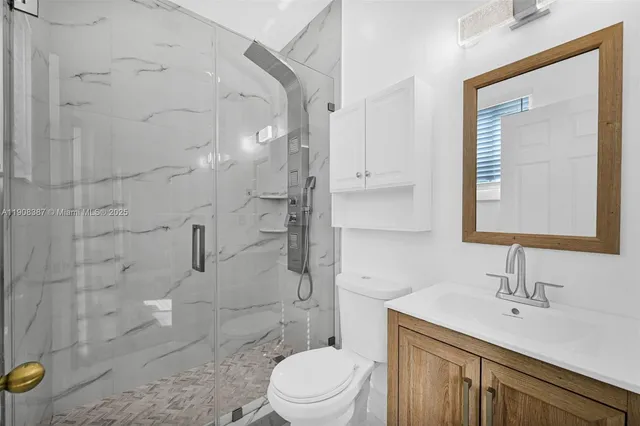 a bedroom with bed and window