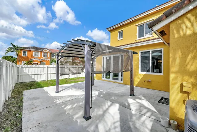 an aerial view of residential building with outdoor space