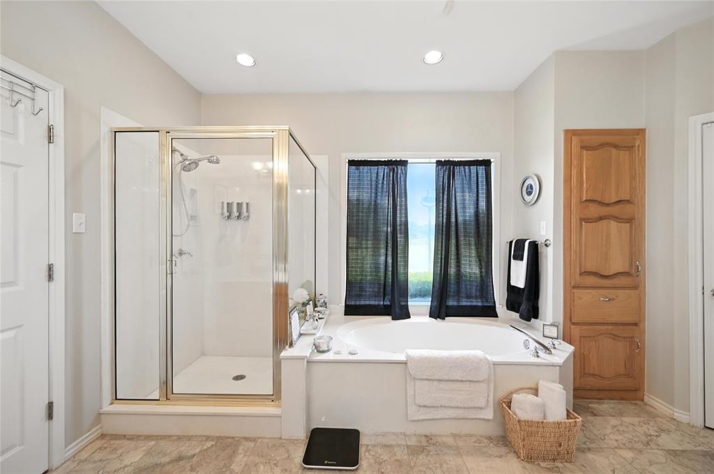 2134 Rains County Road 1402 Point, TX 75472 - Photo 8 of 15 a bathroom with a tub sink and mirror