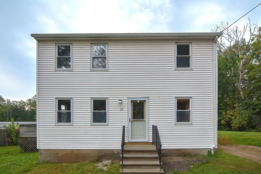 12 Oxbow Road Charlton, MA 01507 - Photo 1 of 40 a front view of a house with a yard