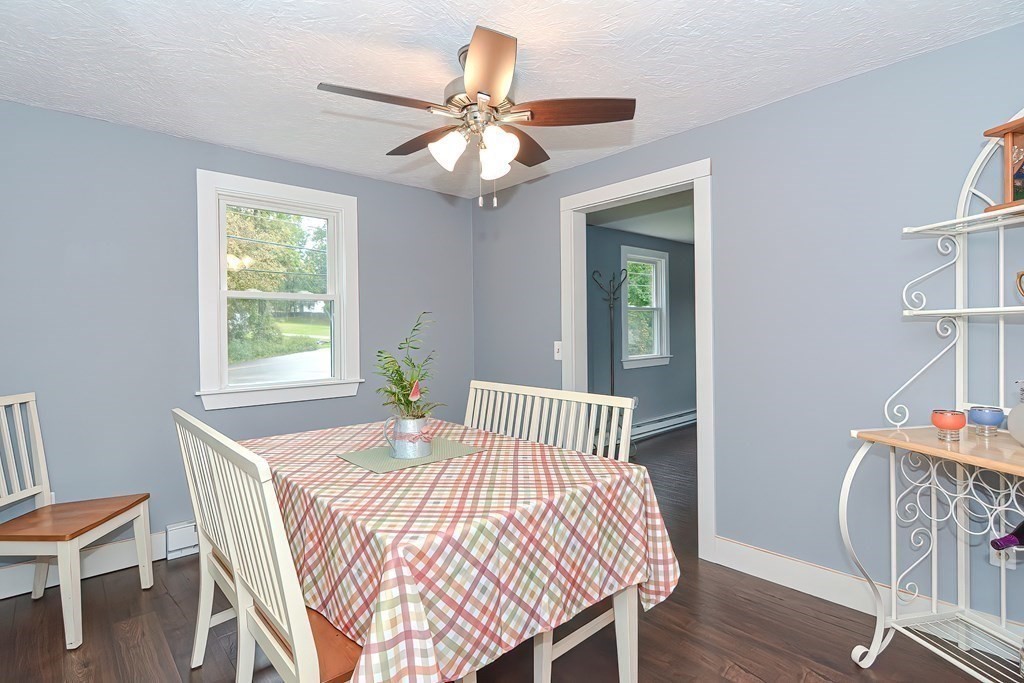 12 Oxbow Road Charlton, MA 01507 - Photo 13 of 40 a bedroom with a bed and a table in it