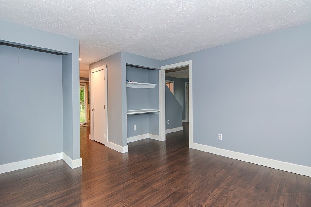 12 Oxbow Road Charlton, MA 01507 - Photo 18 of 40 a view of empty room with wooden floor