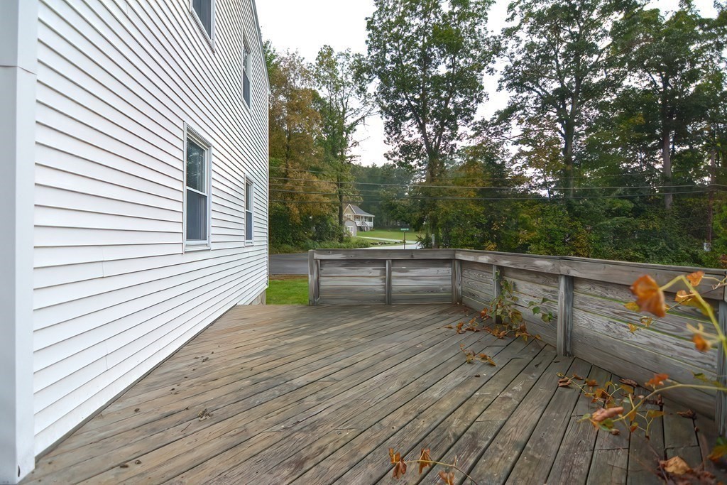 12 Oxbow Road Charlton, MA 01507 - Photo 23 of 40 a terrace with outdoor seating and wooden floor