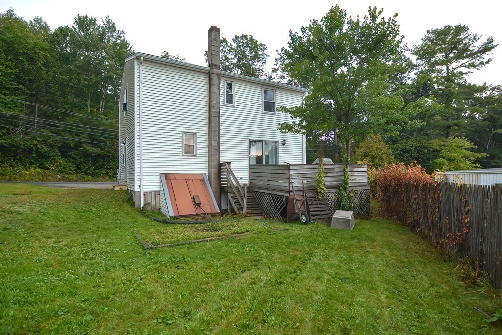12 Oxbow Road Charlton, MA 01507 - Photo 25 of 40 a view of a house with backyard and sitting area