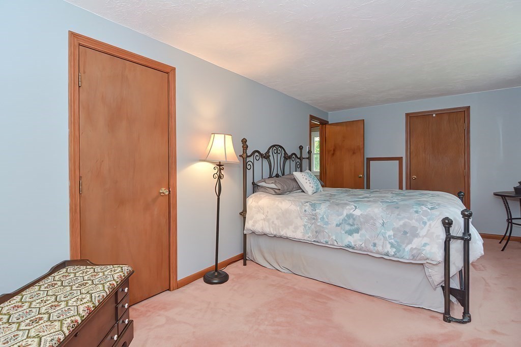 12 Oxbow Road Charlton, MA 01507 - Photo 27 of 40 a bedroom with a bed and window