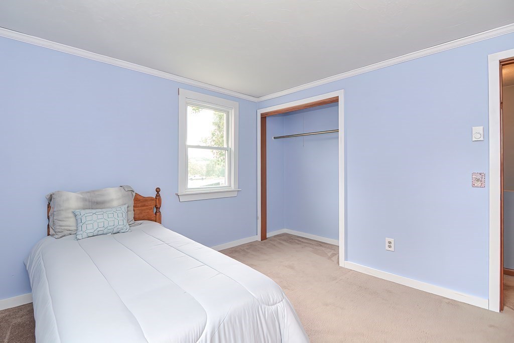 12 Oxbow Road Charlton, MA 01507 - Photo 33 of 40 a bedroom with a bed and a window