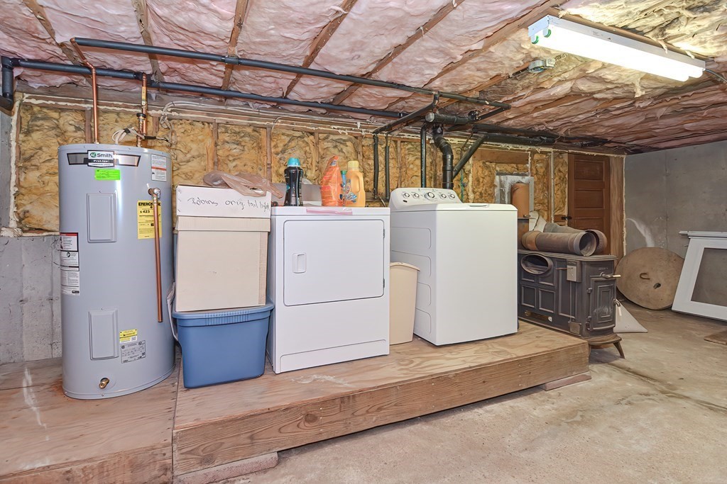 12 Oxbow Road Charlton, MA 01507 - Photo 39 of 40 a view of a storage & utility room with washer and dryer