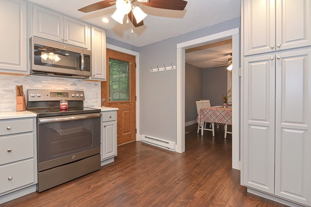 12 Oxbow Road Charlton, MA 01507 - Photo 7 of 40 a kitchen with a refrigerator stove and microwave
