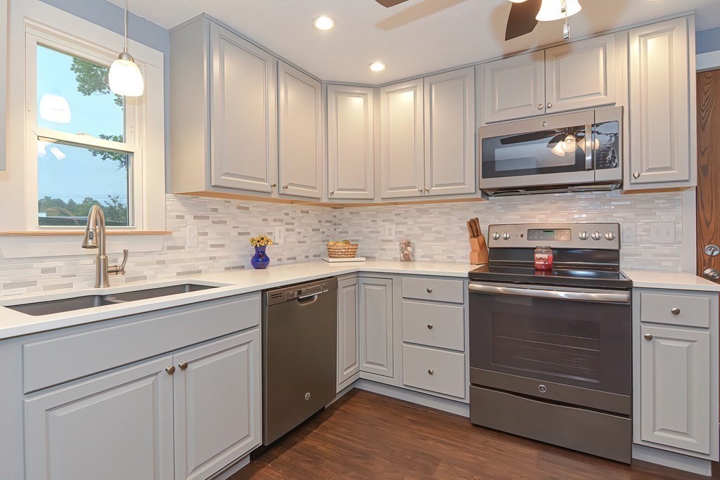 12 Oxbow Road Charlton, MA 01507 - Photo 9 of 40 a kitchen with cabinets appliances and a sink
