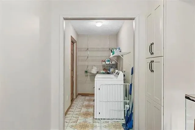 a room that has a washer and dryer