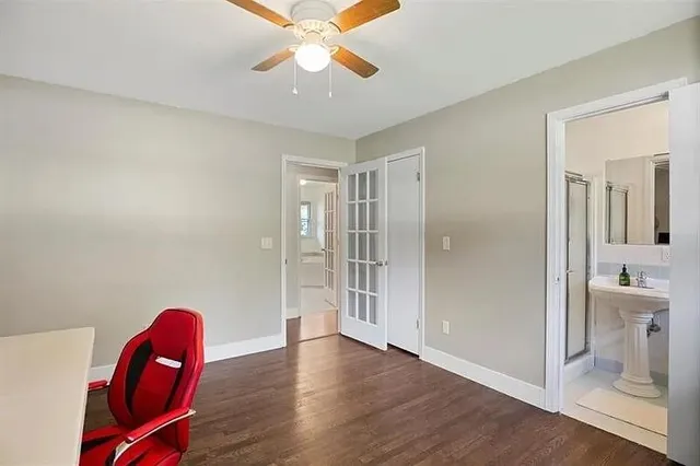 a view of a room with a furniture and wooden floor