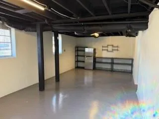 a view of storage and utility room