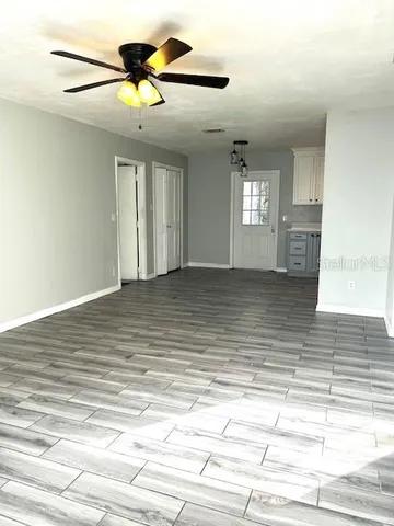 a view of an empty room and window