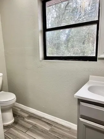a bathroom with a toilet