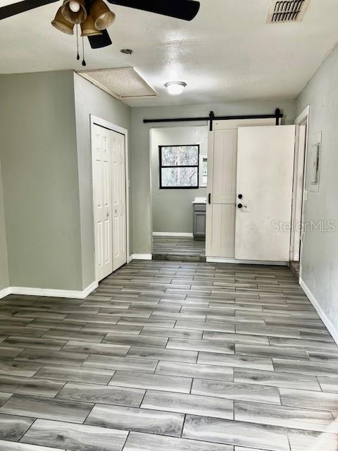 37 Cedar Tree Terrace Ocala, FL 34472 - Photo 10 of 21 a view of a livingroom with a ceiling fan and wooden floor