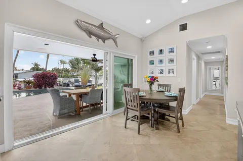 a kitchen with stainless steel appliances granite countertop a sink and stove top oven