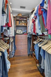 a room with a bed and a window