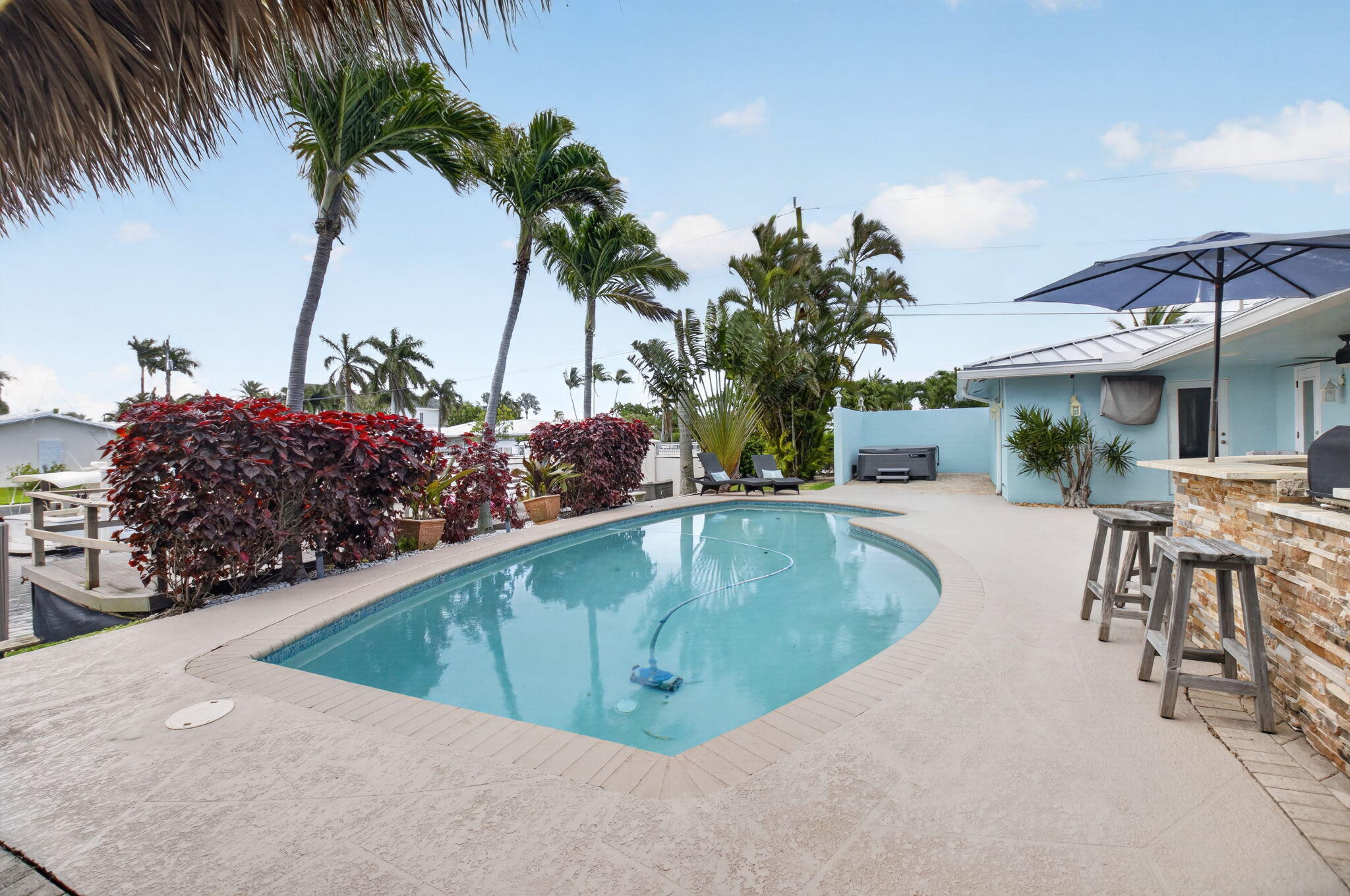 5800 Northeast 7th Avenue Boca Raton, FL 33487 - Photo 44 of 61 a view of outdoor space and swimming pool