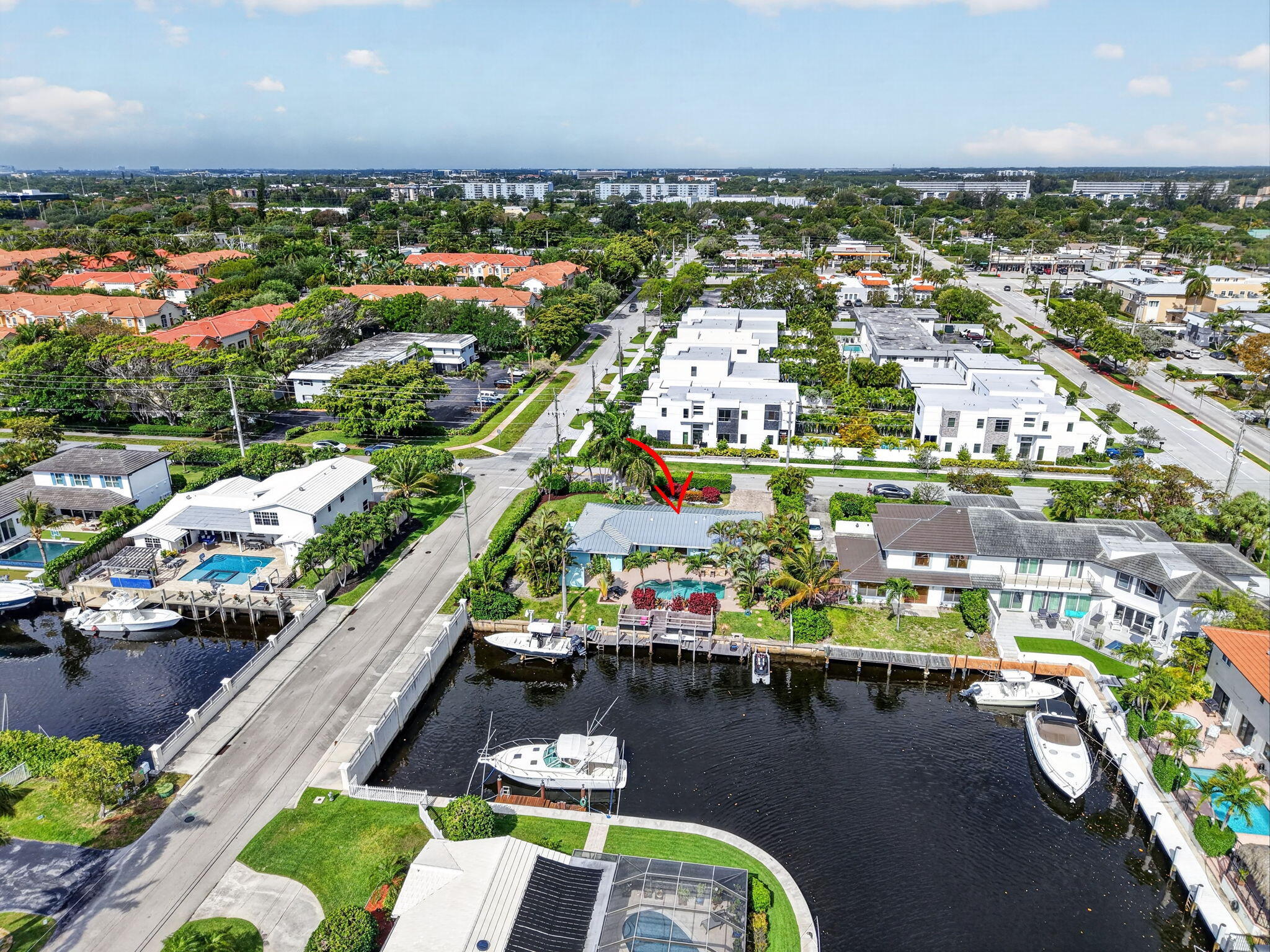 5800 Northeast 7th Avenue Boca Raton, FL 33487 - Photo 55 of 61 an aerial view of a city with lawn chairs