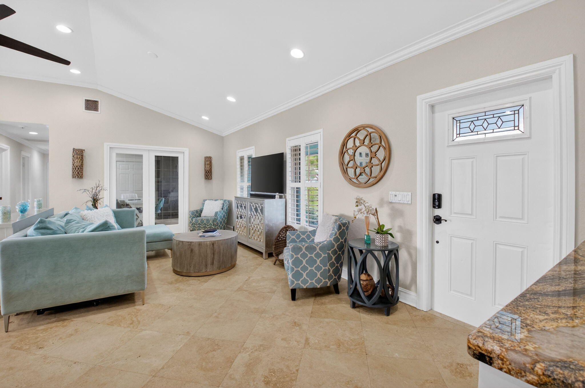 5800 Northeast 7th Avenue Boca Raton, FL 33487 - Photo 6 of 61 a living room with furniture a clock and a window