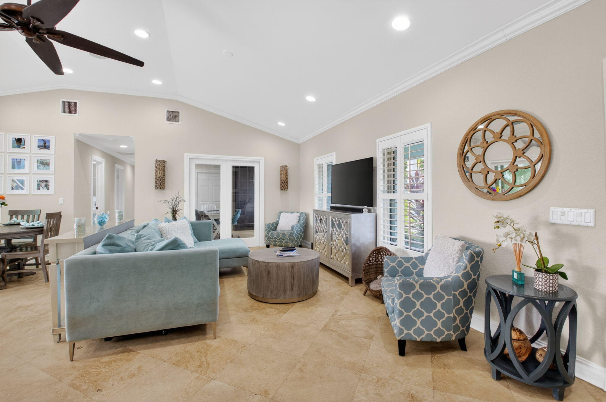 5800 Northeast 7th Avenue Boca Raton, FL 33487 - Photo 9 of 61 a living room with furniture and a flat screen tv