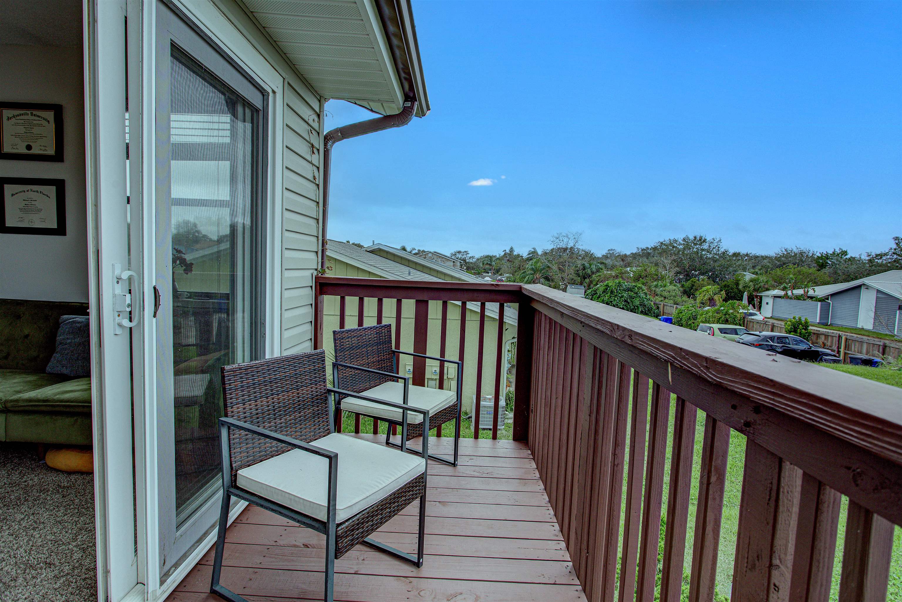 118 Rio Del Mar Street St. Augustine, FL 32080 - Photo 20 of 24 a view of a balcony with chairs