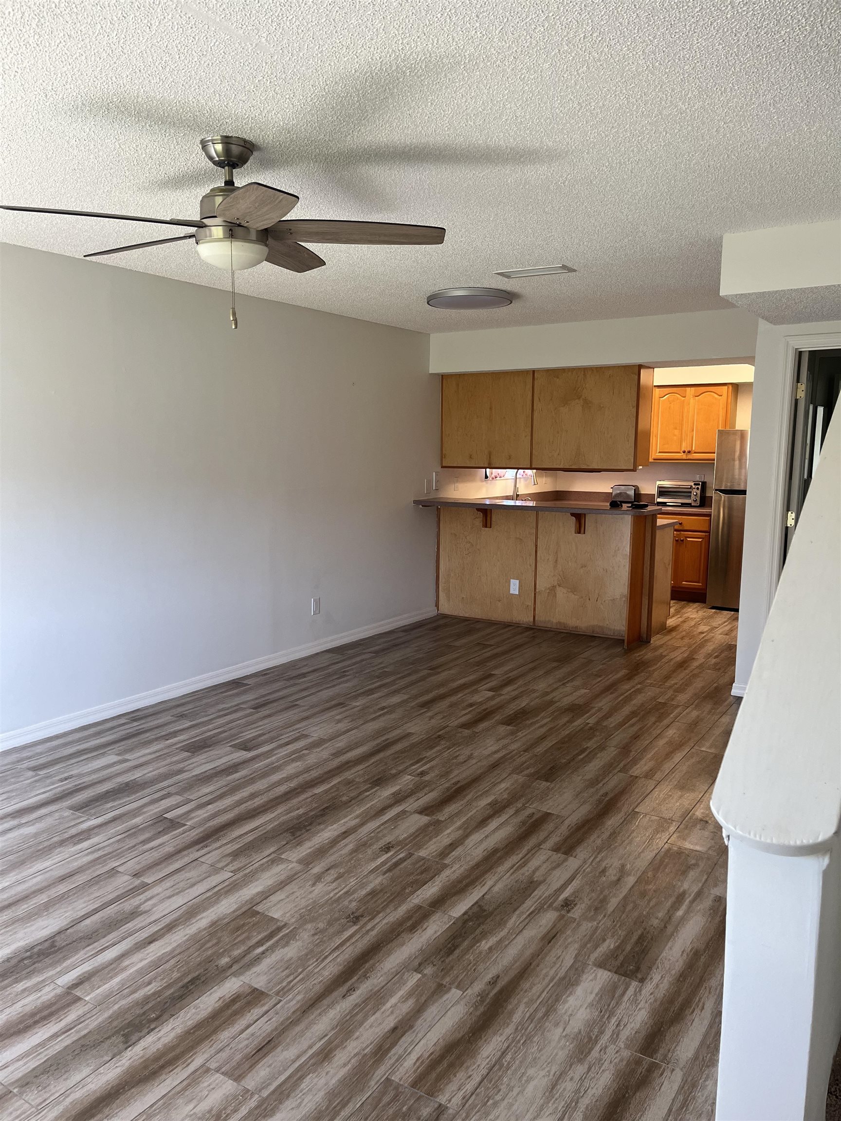 118 Rio Del Mar Street St. Augustine, FL 32080 - Photo 3 of 24 a view of a room with wooden floor